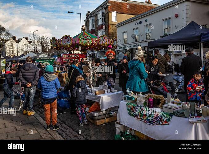 Wimbledon Village Christmas Fair, people visit the special Christmas  Farmers market part of the annual Christmas fair, west London, England, UK  Stock Photo - Alamy