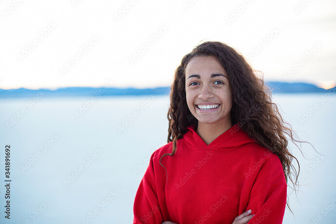 Outdoor portrait of a beautiful mixed race teenage girl. Cute diverse head  and shoulders photo of a real teen girl outdoors Stock Photo | Adobe Stock