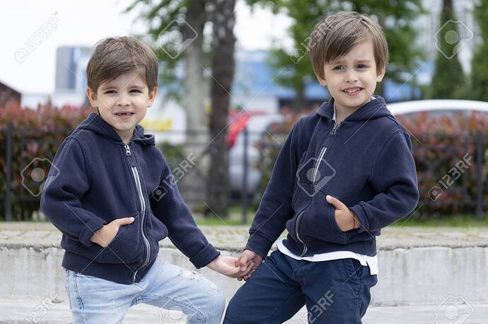 Cute Four Year Old Fraternal Twins In Fashionable Clothes Are Posing For  The Camera Stock Photo, Picture And Royalty Free Image. Image 122689170.